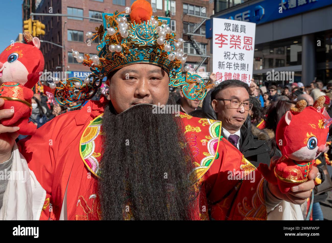 New York, United States. 25th Feb, 2024. People wearing different costumes participate in the annual Lunar New Year parade in Chinatown on February 25, 2024 in New York City. People gathered to enjoy and celebrate the 26th annual Lunar New Year parade, commemorating the end of the 15 days honoring the first new moon on the lunar calendar. 2024 is the 'Year of the Dragon.' Credit: SOPA Images Limited/Alamy Live News Stock Photo