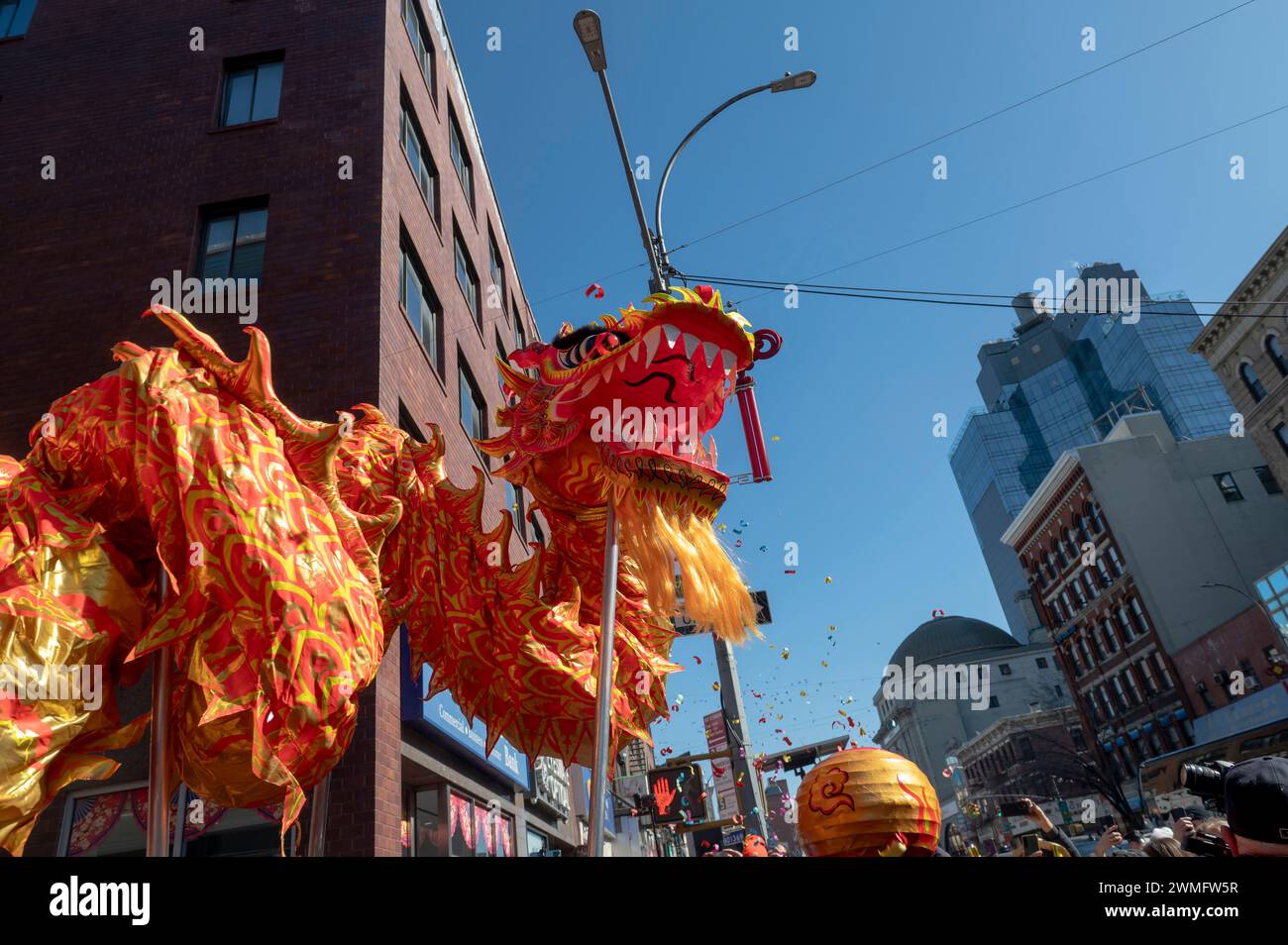 New York, United States. 25th Feb, 2024. Dragon dancers participate in the annual Lunar New Year parade in Chinatown on February 25, 2024 in New York City. People gathered to enjoy and celebrate the 26th annual Lunar New Year parade, commemorating the end of the 15 days honoring the first new moon on the lunar calendar. 2024 is the 'Year of the Dragon.' Credit: SOPA Images Limited/Alamy Live News Stock Photo
