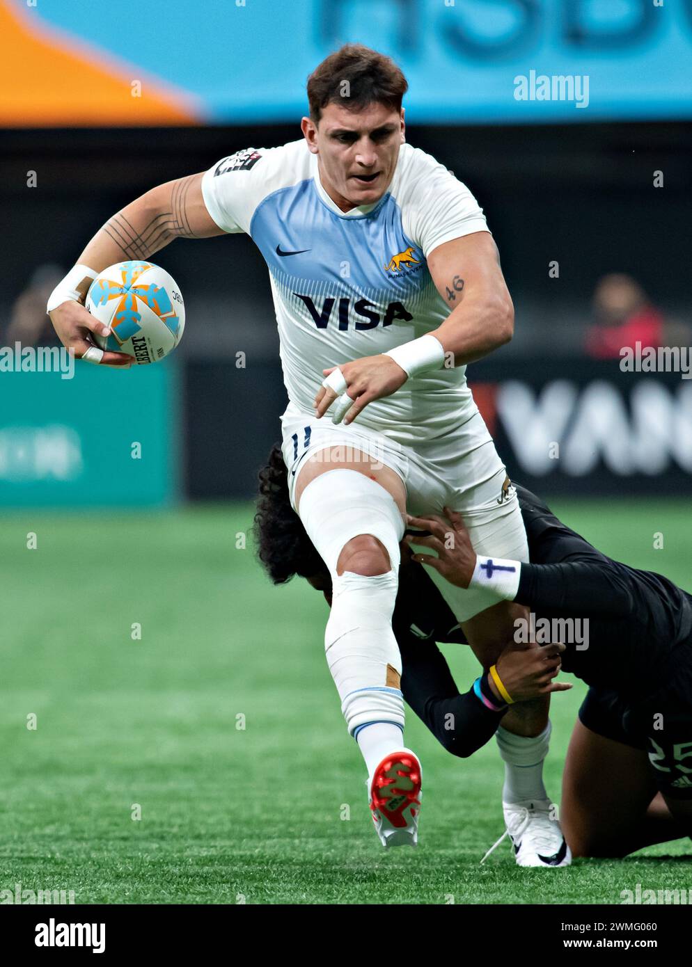Vancouver, Canada. 25th Feb, 2024. Luciano Gonzalez (top) of Argentina competes during the men's final of HSBC Canada Rugby Sevens at BC Place stadium in Vancouver, Canada, on Feb. 25, 2024. Credit: Andrew Soong/Xinhua/Alamy Live News Stock Photo