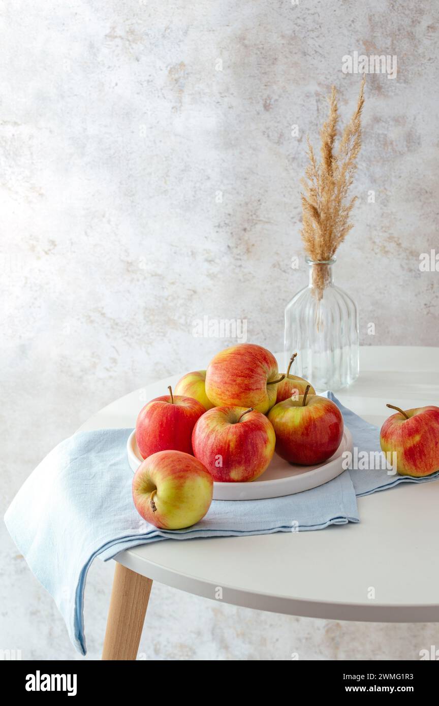 ripe red apples on the table Stock Photo