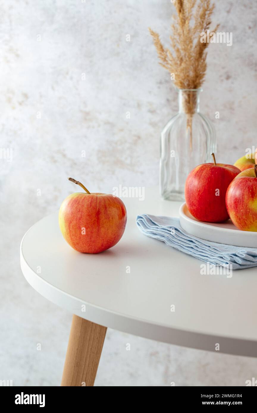 ripe red apples on the table Stock Photo