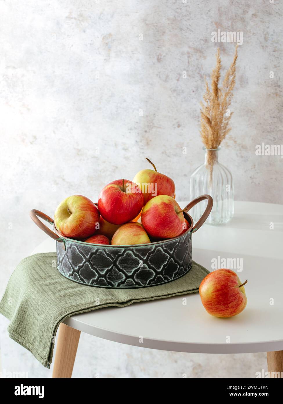 ripe red apples on the table Stock Photo