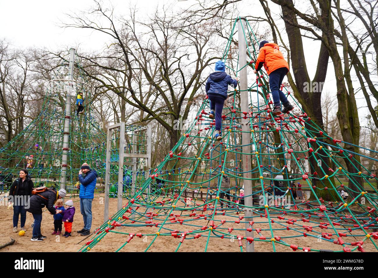The parents and children in a playground in Solacki Park. Poznan, Poland Stock Photo