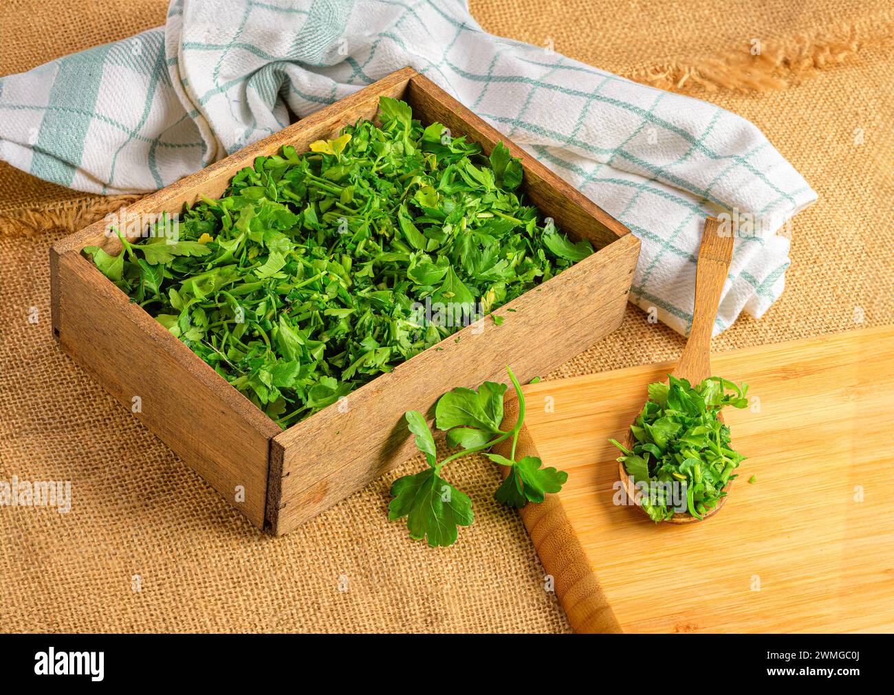 The Organic Inspiration: Wooden Utensils and Fresh Herbs Stock Photo