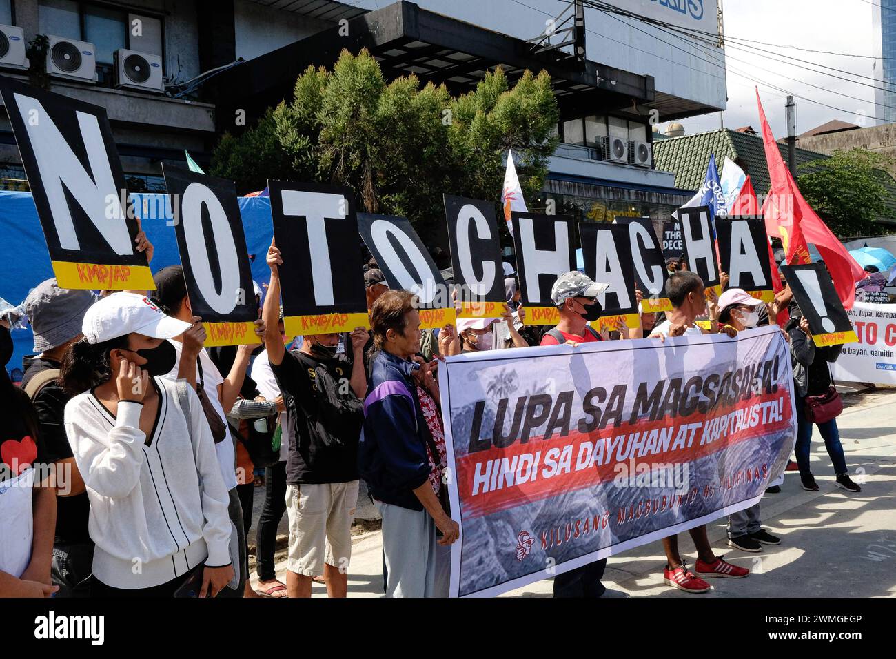 Thousands of Filipino activists commemorated the 38th EDSA People Power Uprising Multiple progressive organizations and faith-based groups gathered at the EDSA Shrine in Mandaluyong City, Philippines on 25 February 2024 to commemorate the 38th anniversary of the EDSA People Power Uprising. Activists portrayed the commemoration by mourning at the casket of freedom and democracy as a sign of the death of the hallmarks of democratic governance. They criticized the current endeavor of politicians to amend the protectionist economic provision of the 1987 Constitution, or Charter Change  ChaCha , as Stock Photo