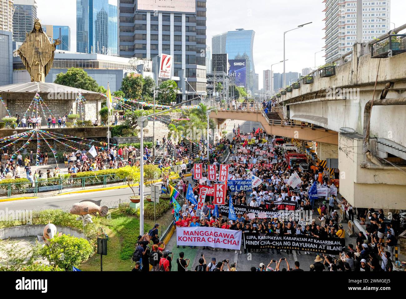 Thousands of Filipino activists commemorated the 38th EDSA People Power Uprising Multiple progressive organizations and faith-based groups gathered at the EDSA Shrine in Mandaluyong City, Philippines on 25 February 2024 to commemorate the 38th anniversary of the EDSA People Power Uprising. Activists portrayed the commemoration by mourning at the casket of freedom and democracy as a sign of the death of the hallmarks of democratic governance. They criticized the current endeavor of politicians to amend the protectionist economic provision of the 1987 Constitution, or Charter Change  ChaCha , as Stock Photo