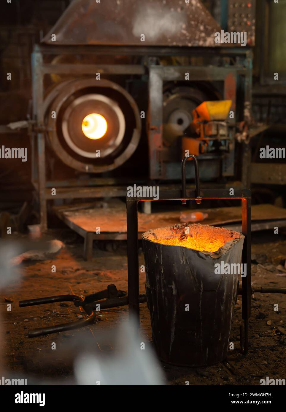 Foundry ladle with molten metal in workshop of metallurgical plant Stock Photo