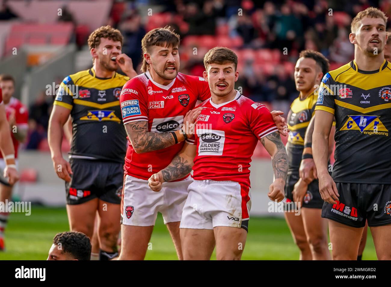 AMIR BOUROUH and team mates celebrate try. Salford Red Devils Vs Castleford Tigers Betfred Super League Round 2, Salford Community Stadium, 25th February 2024. Credit: James Giblin/Alamy Live News. Stock Photo