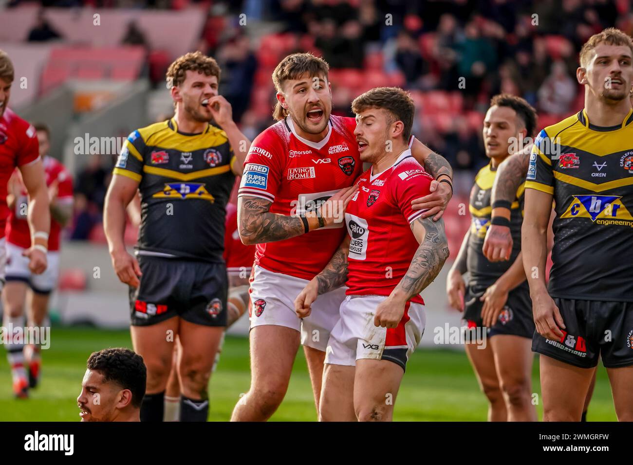 AMIR BOUROUH and team mates celebrate try. Salford Red Devils Vs Castleford Tigers Betfred Super League Round 2, Salford Community Stadium, 25th February 2024. Credit: James Giblin/Alamy Live News. Stock Photo