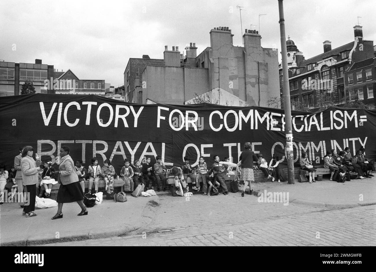 London 1980s. Opening of the new Covent Garden Piazza. The Covent Garden Community Association (CGCA) fought against the commercialism of this central part of London. Their banner, ‘Victory for Commercialism Betrayal of the Community’.  Covent Garden Piazza was opened by Sir Horace Cutler on 19th June 1980. UK HOMER SYKES Stock Photo