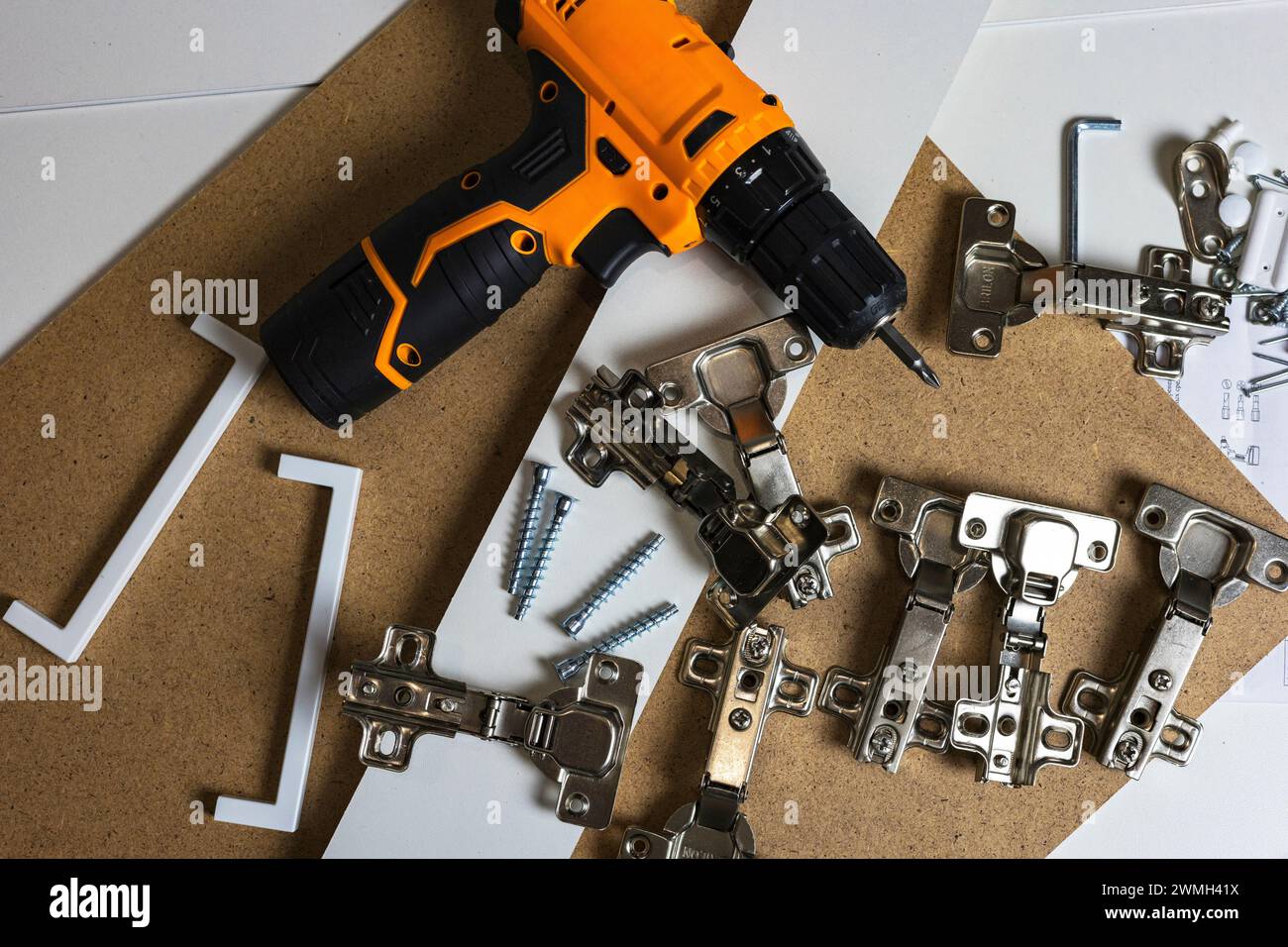 Furniture fittings. Furniture assembly hardware options and tools on a