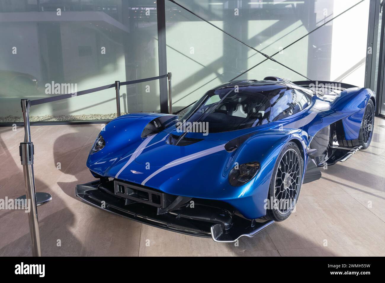 Luxembourg City, Luxembourg - Focus on a blue Aston Martin Valkyrie Spider in a showroom. Stock Photo