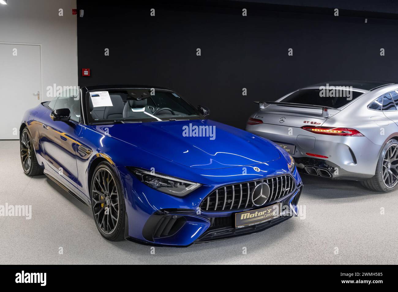 Luxembourg City, Luxembourg - Focus on a blue Mercedes-AMG SL 63 in a showroom. Stock Photo