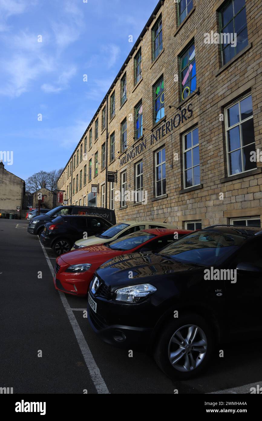 The cars parked in front of Arlington Interiors building in Farsley, England Stock Photo