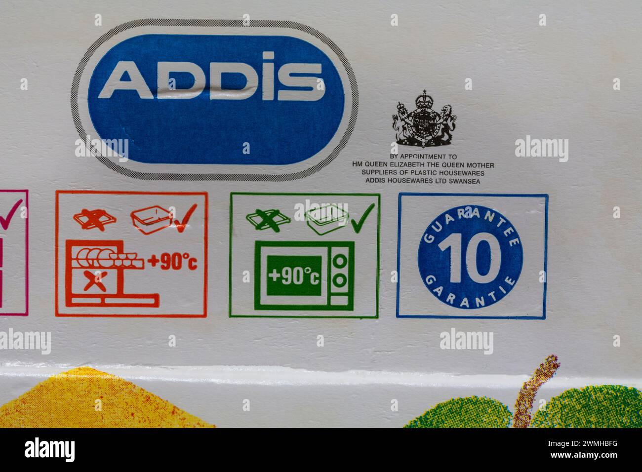 dishwasher and microwave symbols with detail on Addis plastic food container with care and use usage symbols information - Royal Warrant Stock Photo