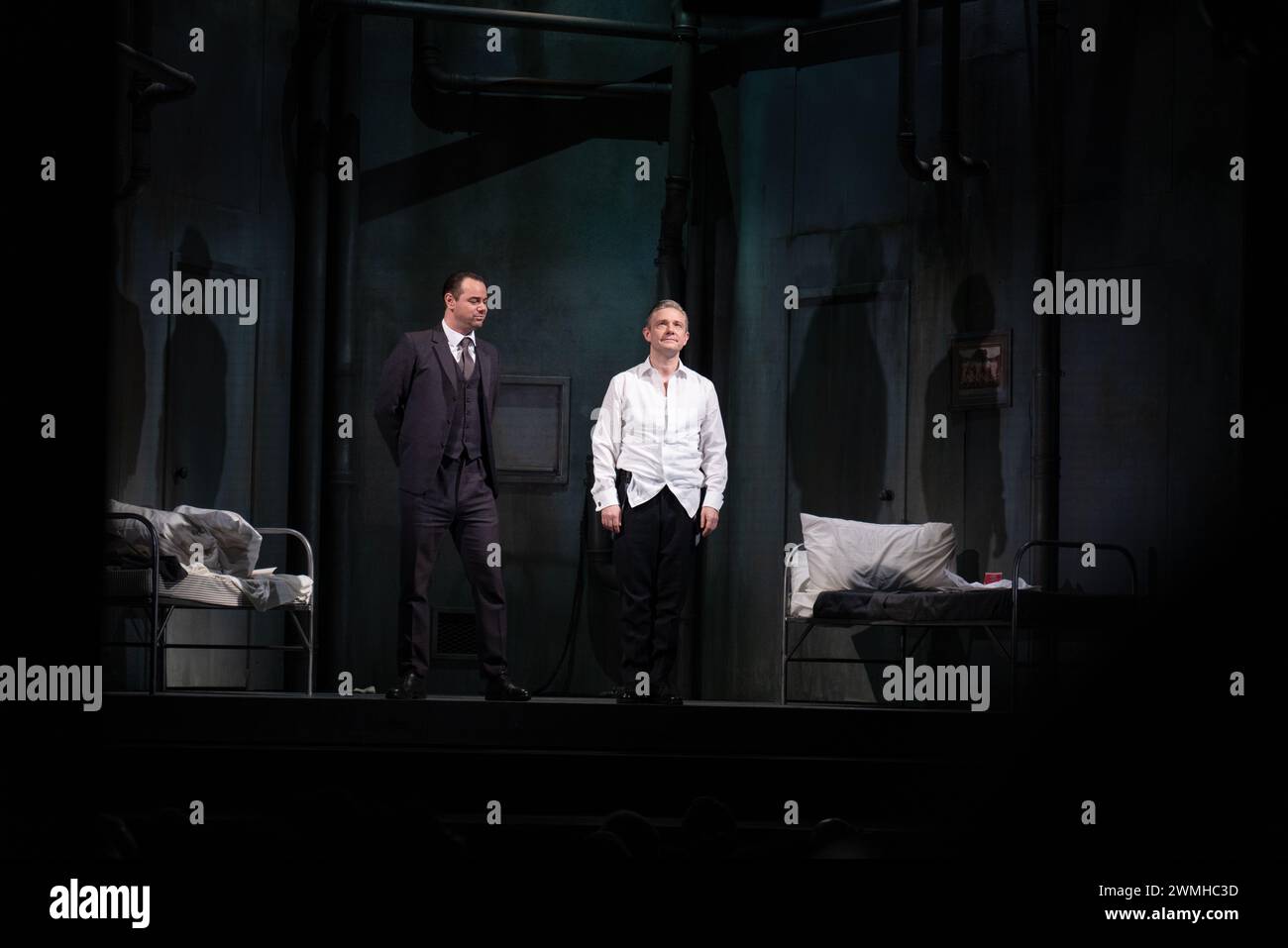 MARTIN FREEMAN, DANY DYER, PINTER PLAY, LONDON, 2019: Actors Martin Freeman and Danny Dyer in the early Harold Pinter play A Dumb Waiter (1958) take their curtain call on stage at the Pinter Theatre in London on 6 February 2019. Photo: Rob Watkins.  INFO: 'The Dumb Waiter' by Harold Pinter is a one-act play that delves into themes of existentialism and absurdity. Set in a basement, it follows two hitmen awaiting their next assignment, navigating cryptic messages from an unseen employer, leading to tension and existential questioning. Stock Photo