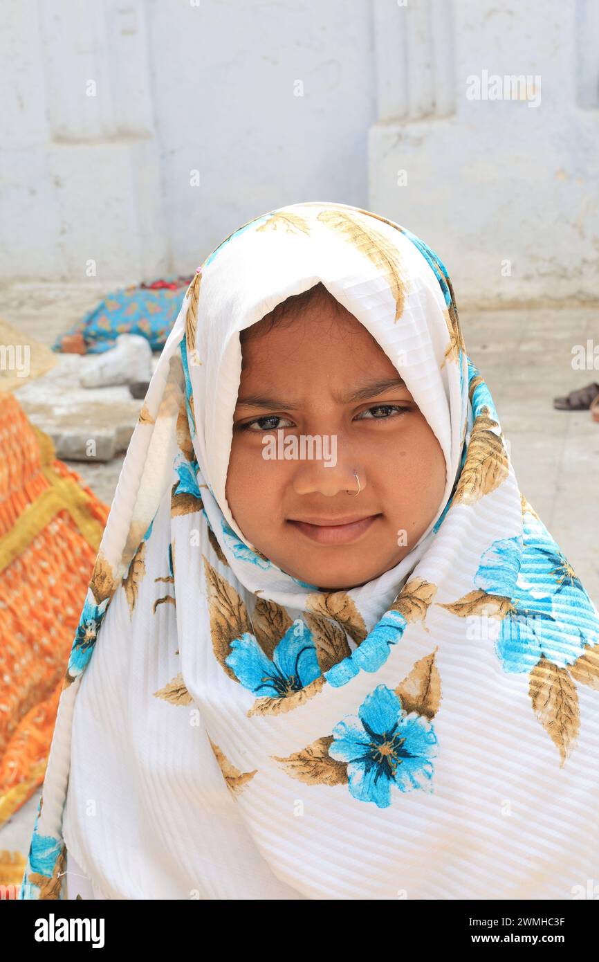 Young girl visiting Haft Gumbad Stock Photo