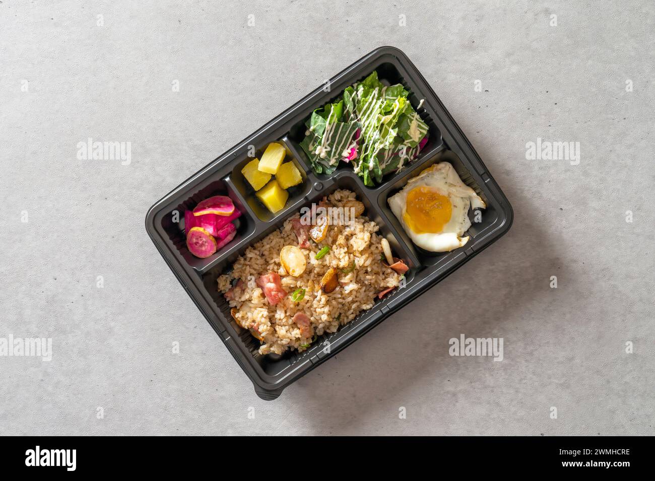 Korean food dish Omurice Lunch box kimchi fried rice Sori Garlic Bacon