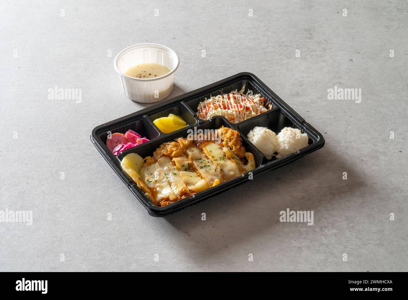 Korean food dish Omurice Lunch box kimchi fried rice Sori Garlic Bacon