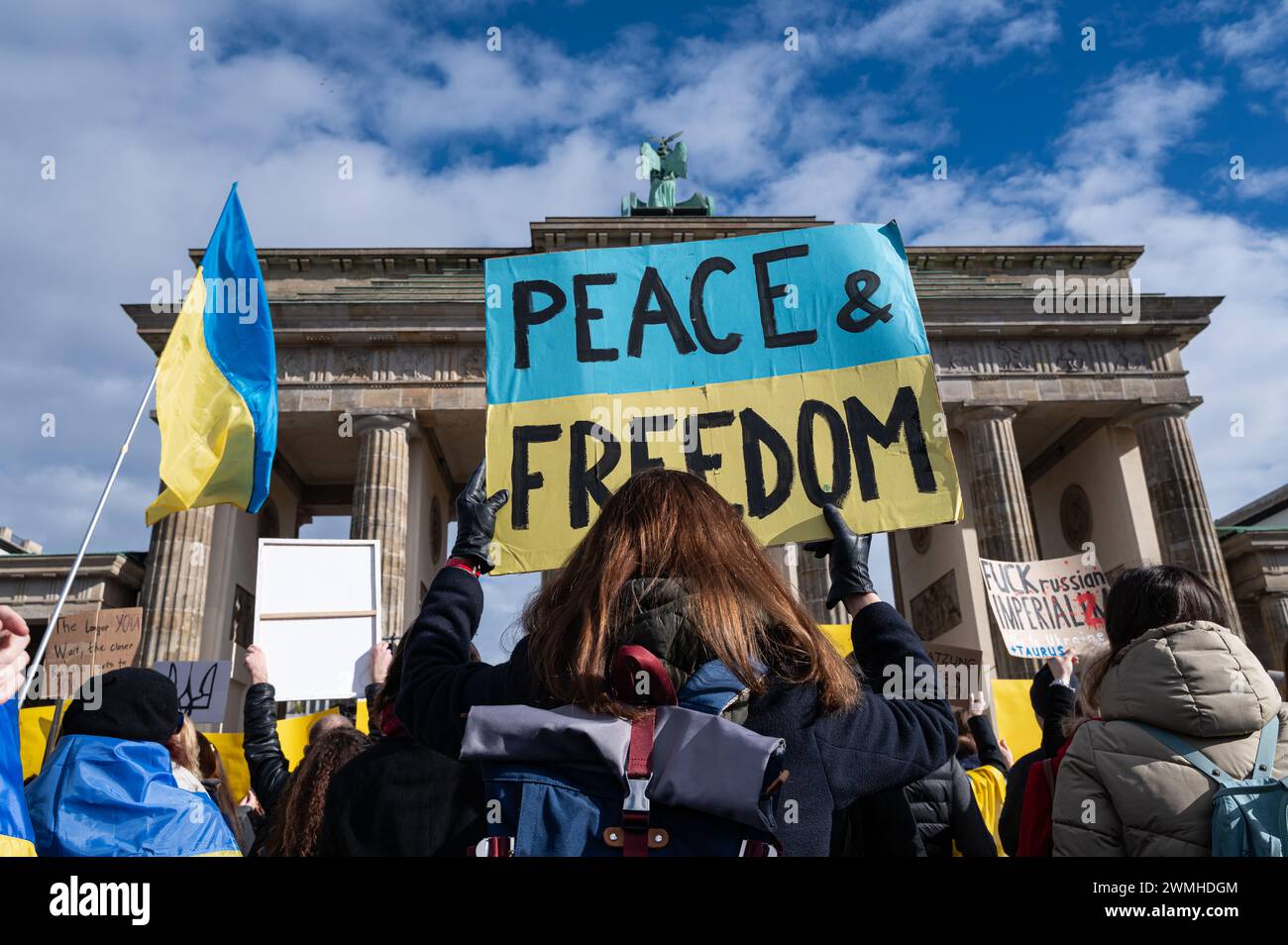 24.02.2024, Berlin, Germany, Europe - Approximately 2,000 people participate in a peaceful pro-Ukrainian protest rally at the Brandenburg Gate. Stock Photo