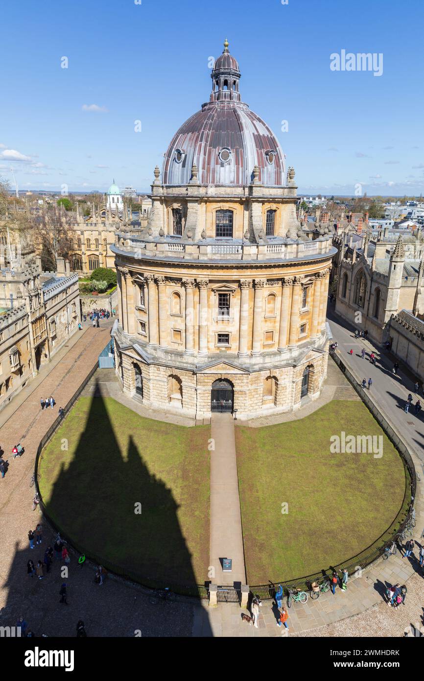 The Radcliffe Camera & shadow from the spire of University Church of St Mary the Virgin, Oxford, England. Stock Photo