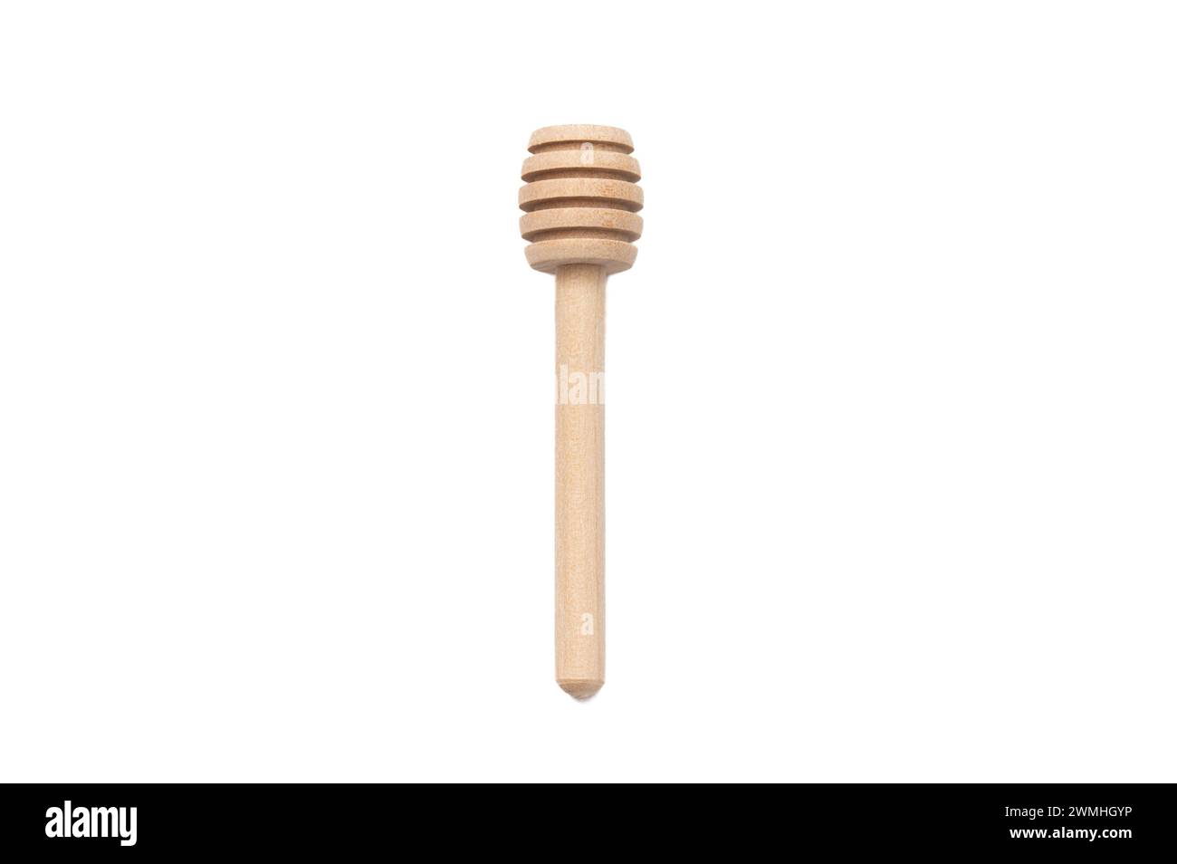 Small wood honey dipper on white background Stock Photo