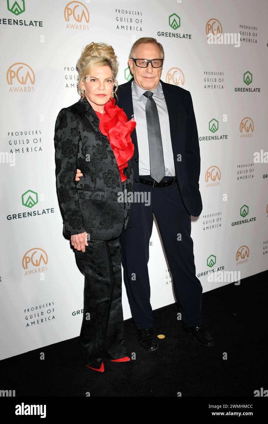 HOLLYWOOD, CALIFORNIA - FEBRUARY 25: (L-R) Stephanie Haymes Roven and Charles Roven attend the 35th Annual Producers Guild Awards at The Ray Dolby Bal Stock Photo