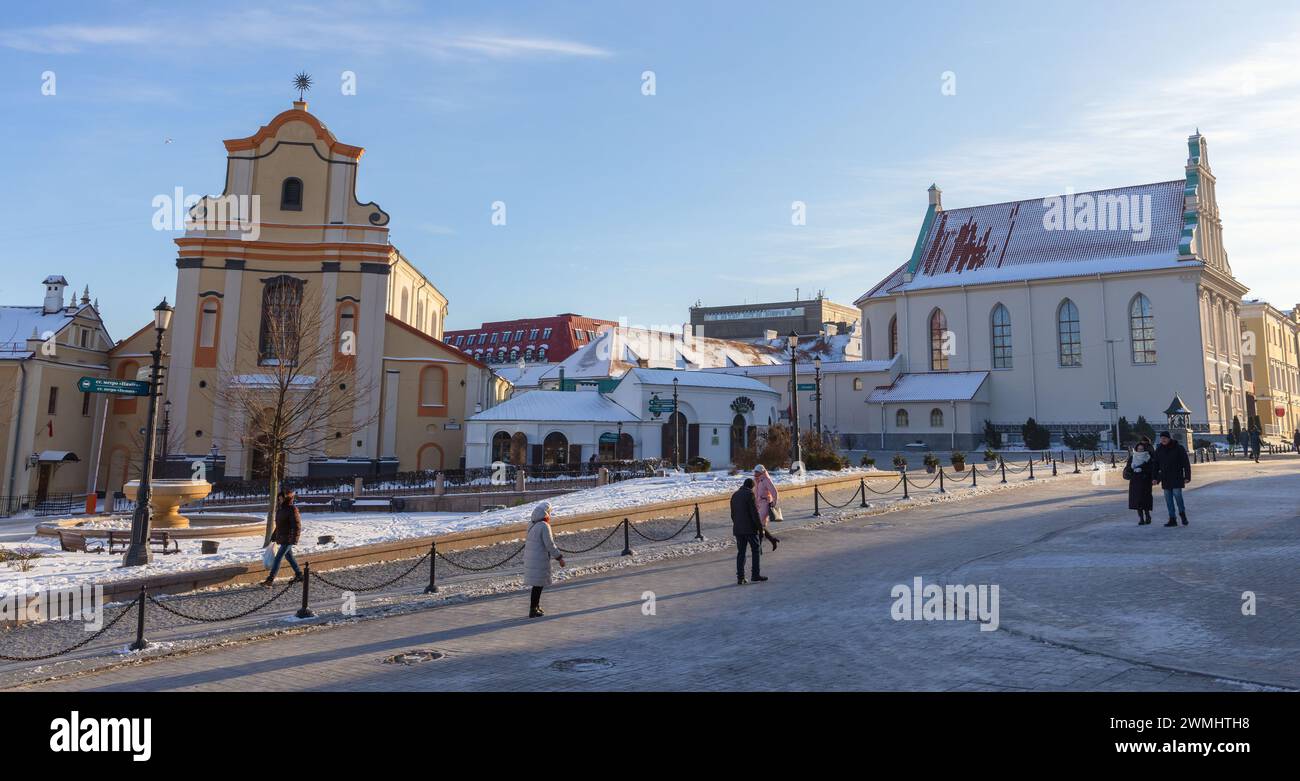 Minsk, Belarus - January 7, 2024: Cyril and Methodius panoramic street view with walking people. Belarusian State Archive-Museum of Literature and Art Stock Photo