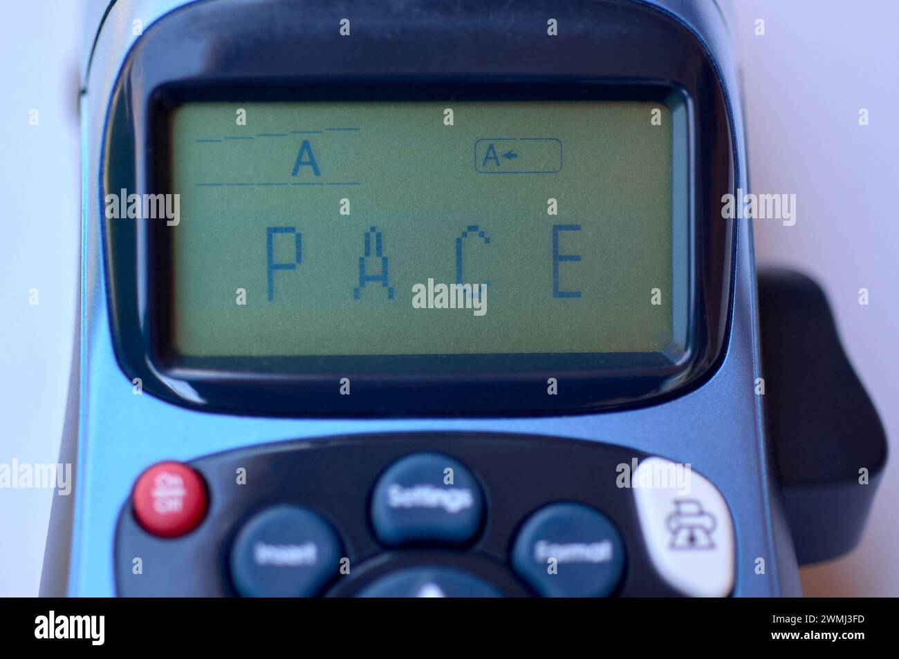 Image of a thermal printer with the word peace on the screen, symbolizing harmony in a digital context. Stock Photo
