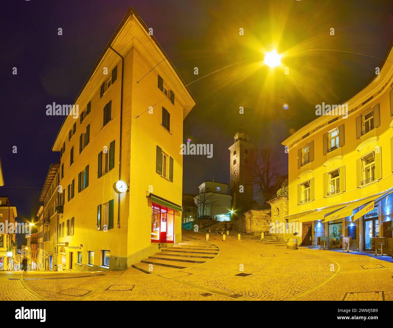 LUGANO, SWITZERLAND - MARCH 17, 2022: Panorama of the scenic curved streets in the heart of old town, on March 17 in Lugano, Switzerland Stock Photo