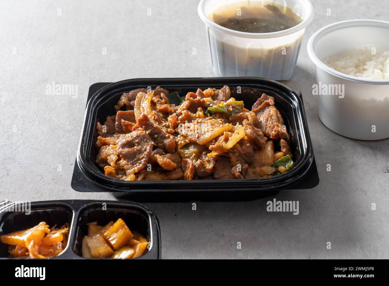 Soy sauce bulgogi, red pepper paste bulgogi over rice Korean food dish Stock Photo Alamy
