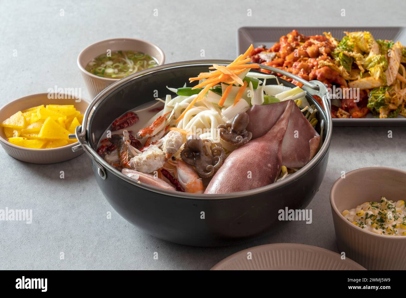 Stirfried chicken feet, squid soup, jjamppong, spicy pork tofu kimchi