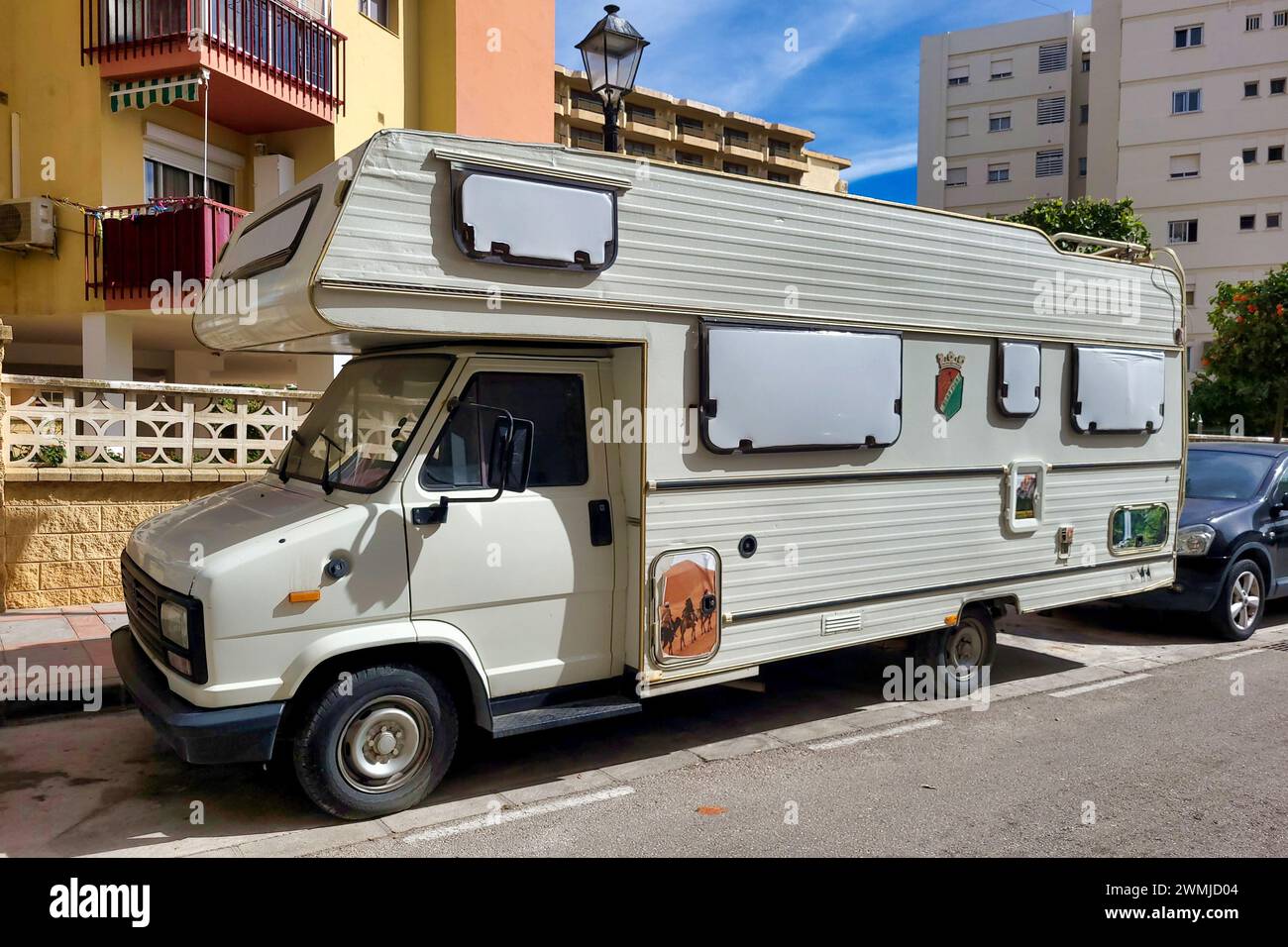 Old Peugeot motorhome parked on a street in Fuengirola, Málaga, Spain. Stock Photo