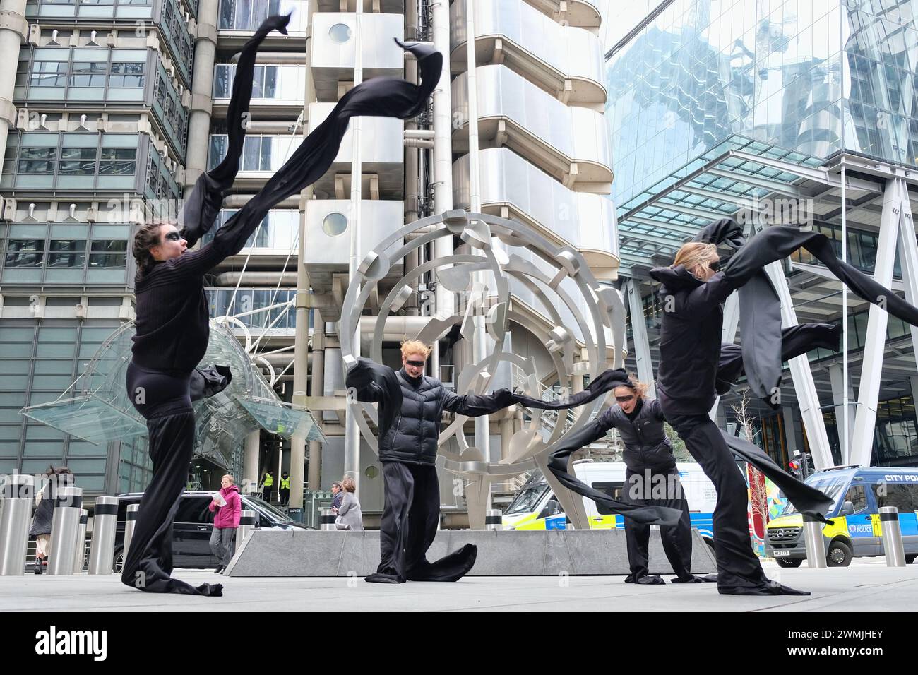 London, UK, 26th February, 2024. Environmental activist group Mothers Rise Up performed a dance piece in protest of insurer Lloyds of London, who play their part in the fossil fuel industry. The action marks the beginning of a week of protests against insurers. Credit: Eleventh Hour Photography/Alamy Live News Stock Photo