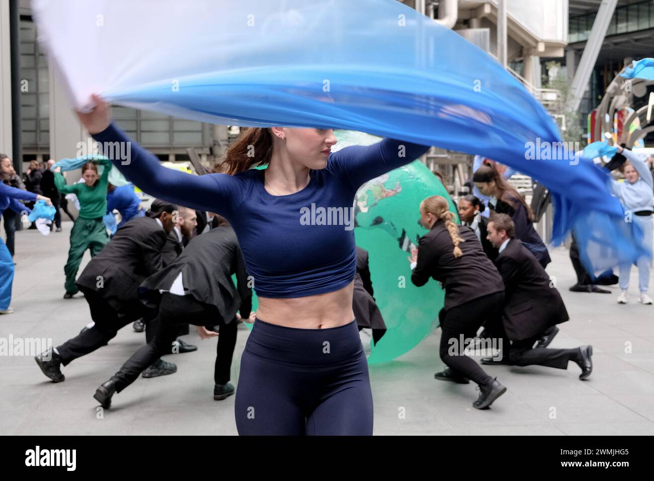 London, UK, 26th February, 2024. Environmental activist group Mothers Rise Up performed a dance piece in protest of insurer Lloyds of London, who play their part in the fossil fuel industry. The action marks the beginning of a week of protests against insurers. Credit: Eleventh Hour Photography/Alamy Live News Stock Photo