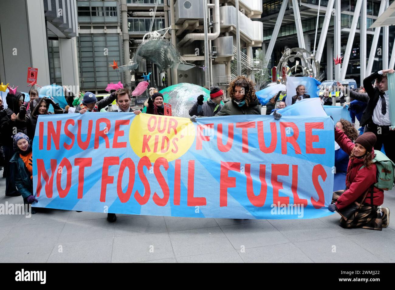 London, UK, 26th February, 2024. Environmental activist group Mothers Rise Up performed a dance piece in protest of insurer Lloyds of London, who play their part in the fossil fuel industry. The action marks the beginning of a week of protests against insurers. Credit: Eleventh Hour Photography/Alamy Live News Stock Photo