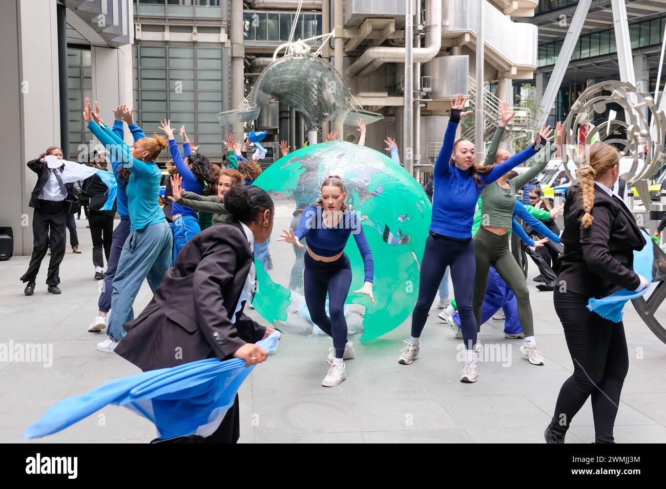 London, UK, 26th February, 2024. Environmental activist group Mothers Rise Up performed a dance piece in protest of insurer Lloyds of London, who play their part in the fossil fuel industry. The action marks the beginning of a week of protests against insurers. Credit: Eleventh Hour Photography/Alamy Live News Stock Photo