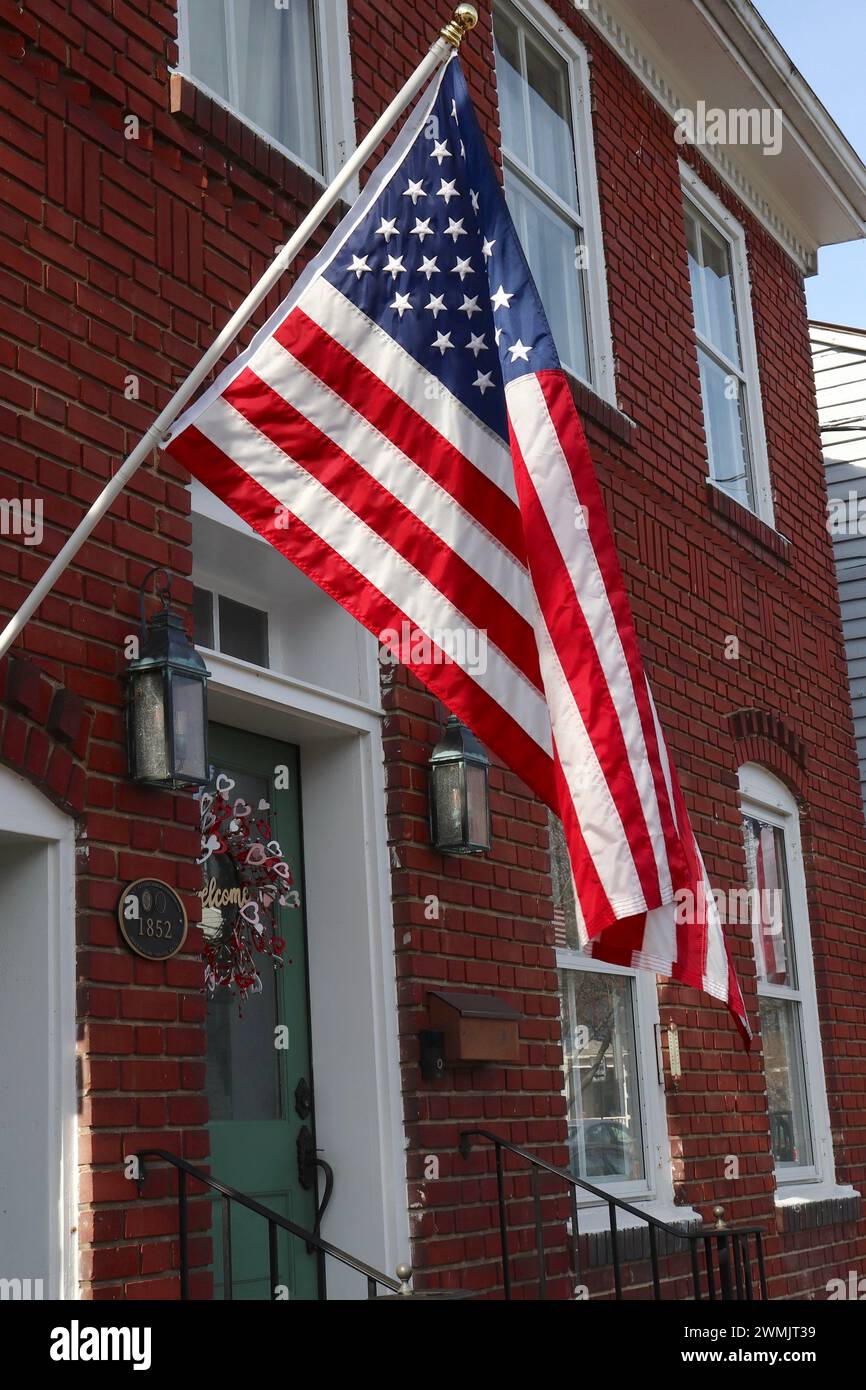 American Flag Attached to Home Stock Photo