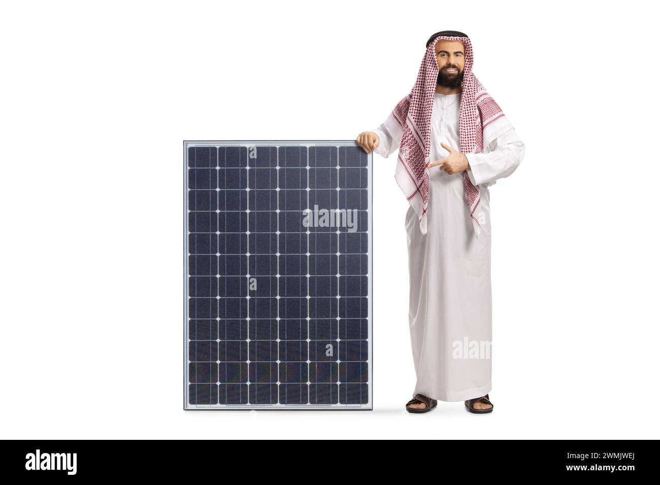 Saudi arab man pointing at a solar panel isolated on white background Stock Photo