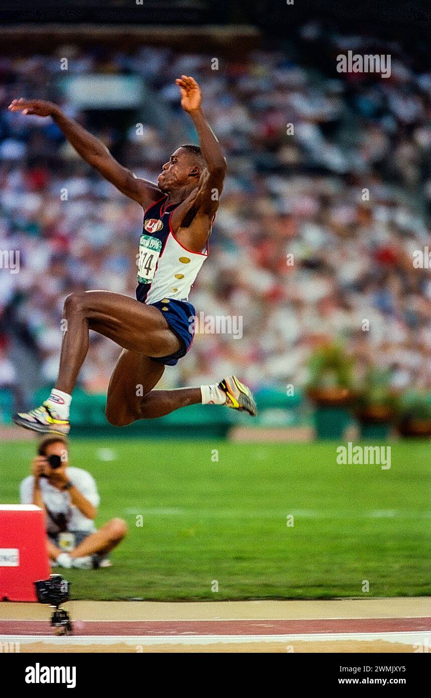 Carl Lewis (USA) win the gold medal in the long jump at the 1996 Olympic Summer Games. Stock Photo