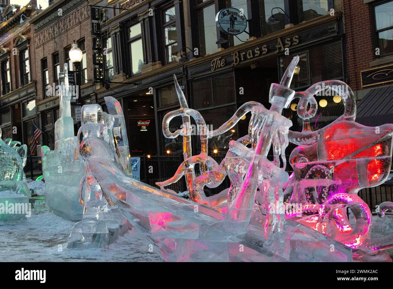 Spectators viewing the 2024 Cripple Creek Ice Festival on Avenue in Cripple Creek