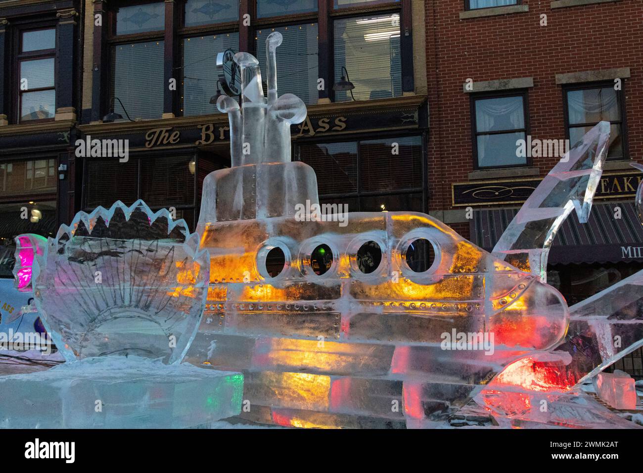 Spectators viewing the 2024 Cripple Creek Ice Festival on Avenue