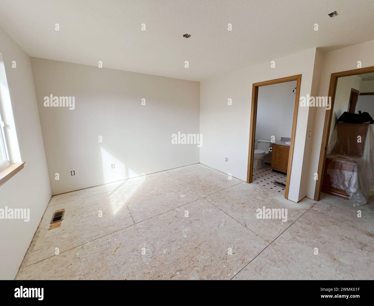 Stunning Textured Hidden Plank Apartment Flooring Installation Process image