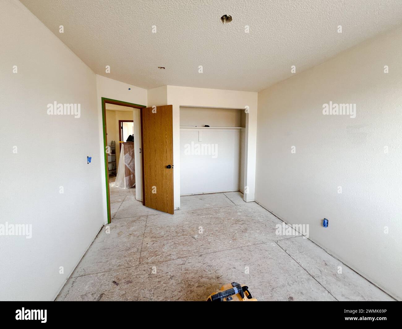Mid-Installation of Vinyl Plank Flooring in Residential Room Stock ... - Textured Hidden Plank Apartment Flooring Installation Process