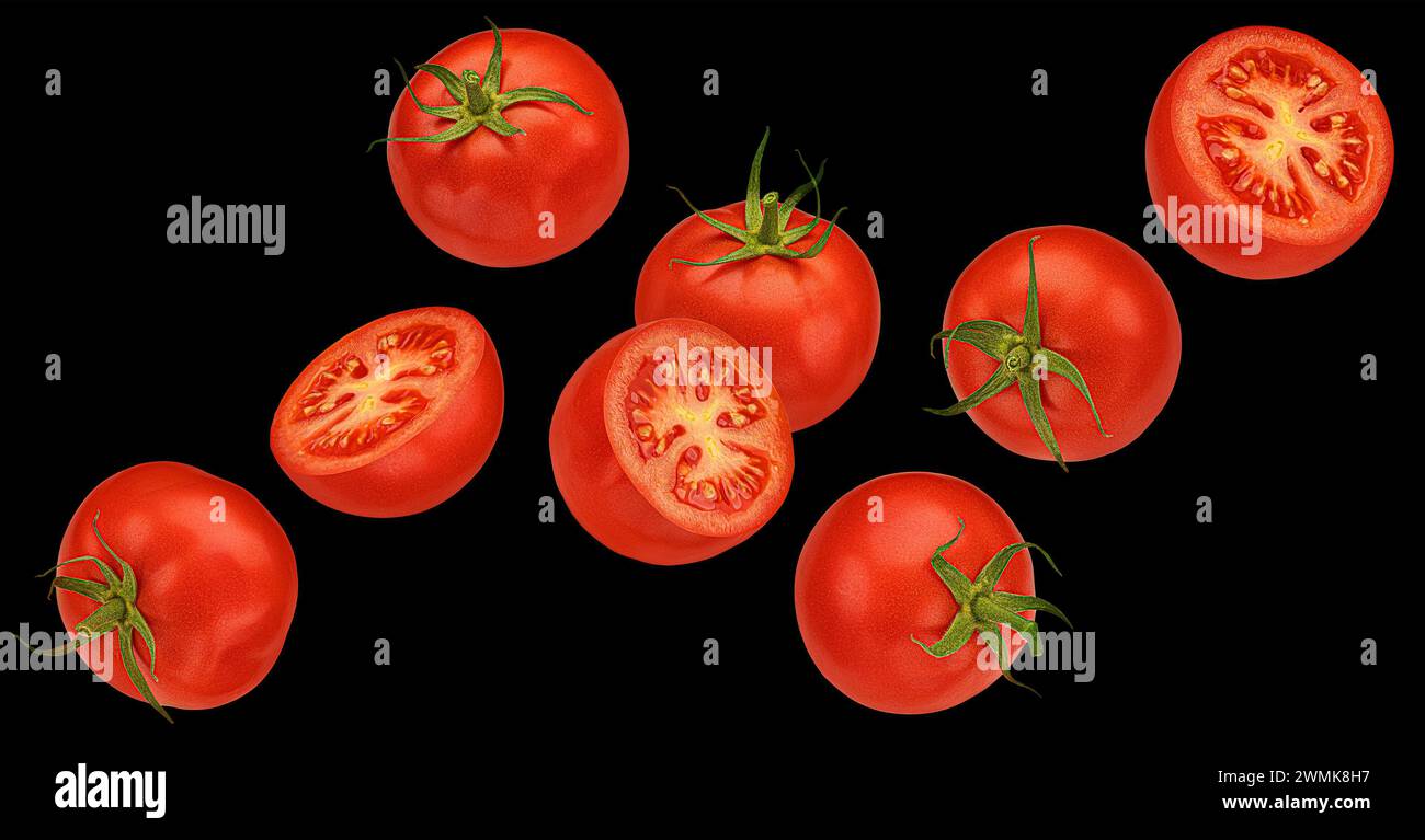 Falling cherry tomatoes on black background Stock Photo