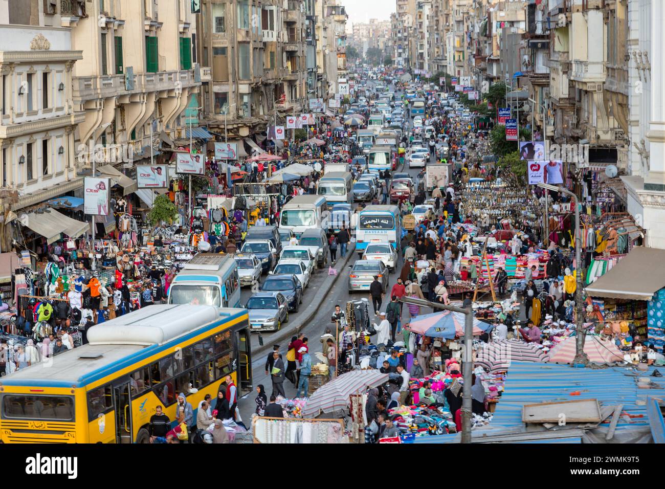 Normal Cairo street activity with congested traffic, people doing commerce and shop venders, Cairo Egypt Stock Photo