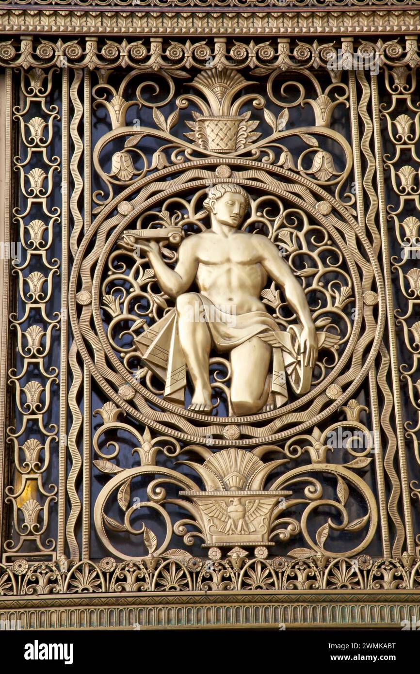 Gilt human figure on an Art Deco style building; Michigan, United States of America Stock Photo