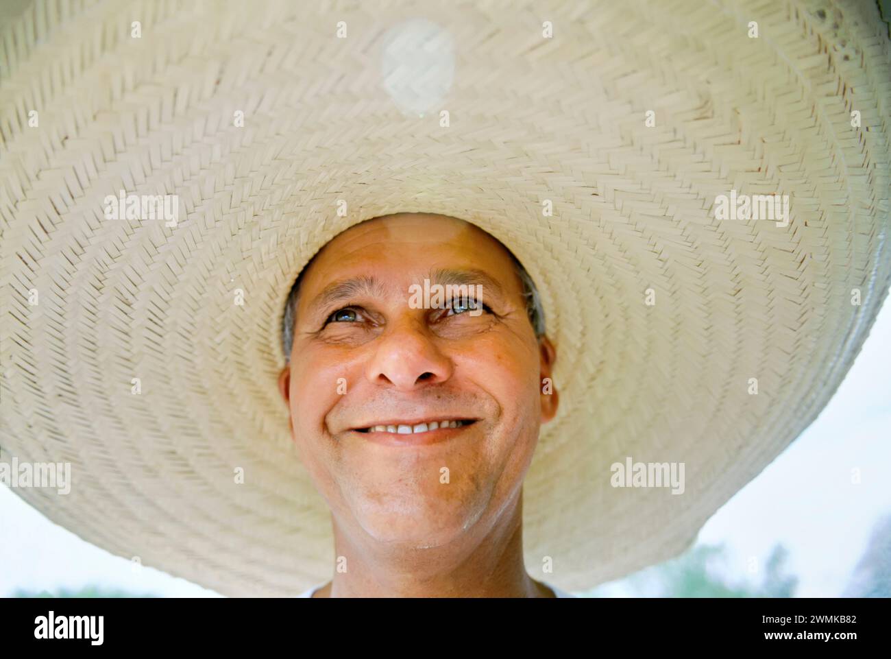 Brazilian man wearing a large brimmed hat; Pantanal Region, Brazil Stock Photo