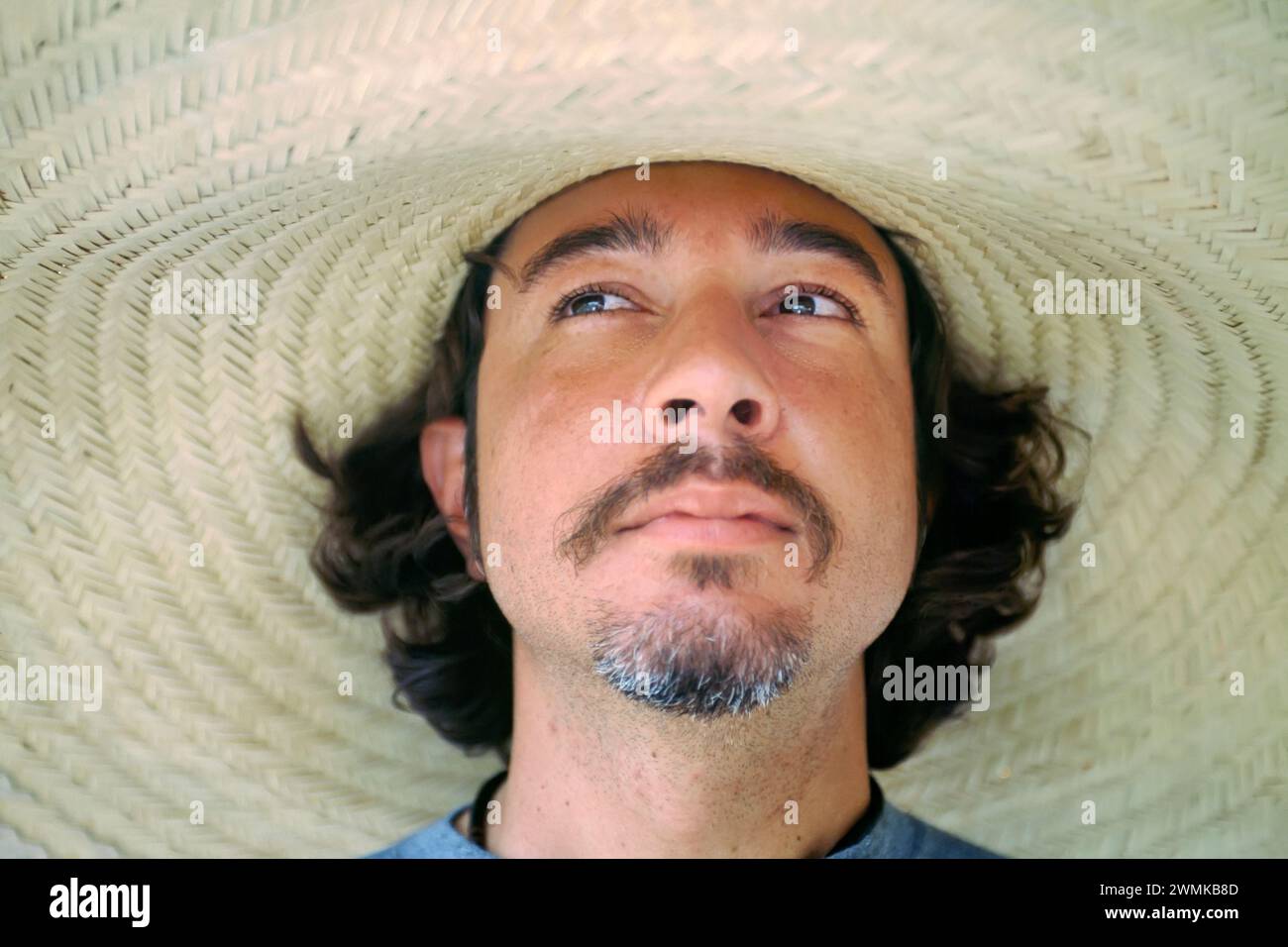 Brazilian man wearing a large brimmed hat; Pantanal Region, Brazil Stock Photo