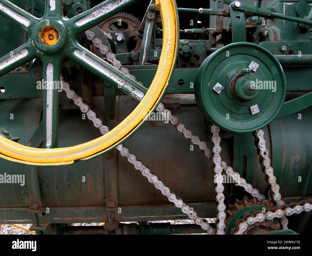 Close-up detail of machinery wheels with bicycle chains Stock Photo
